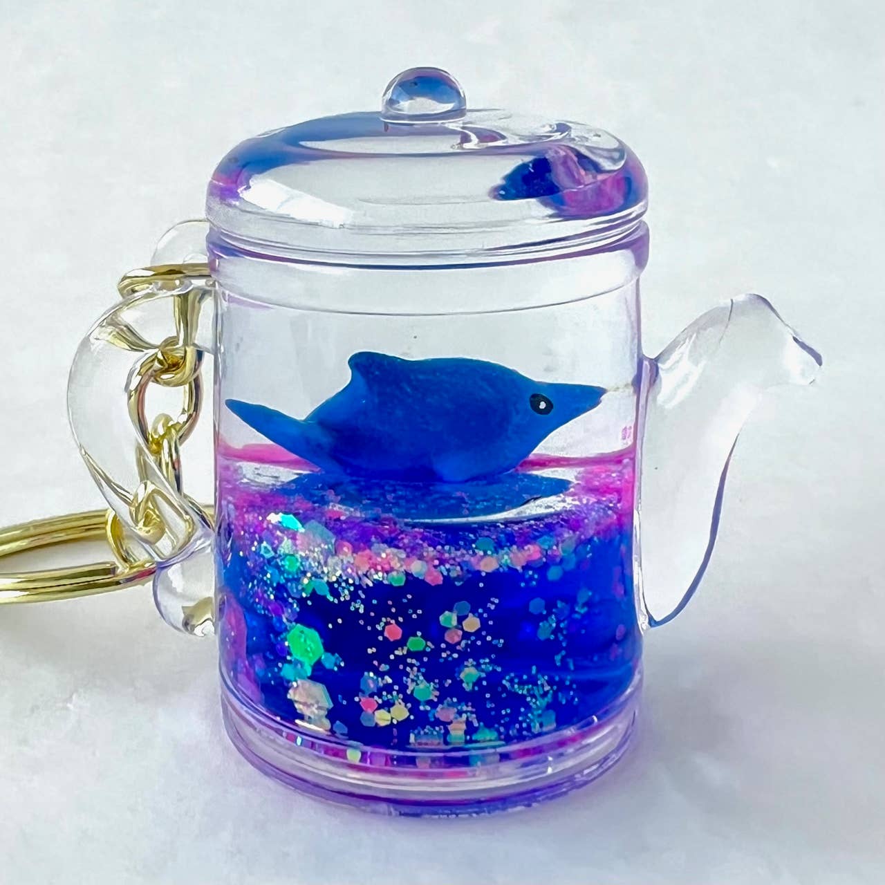 12129 BLUE DOLPHIN COMBO FLOATY KEY CHARM