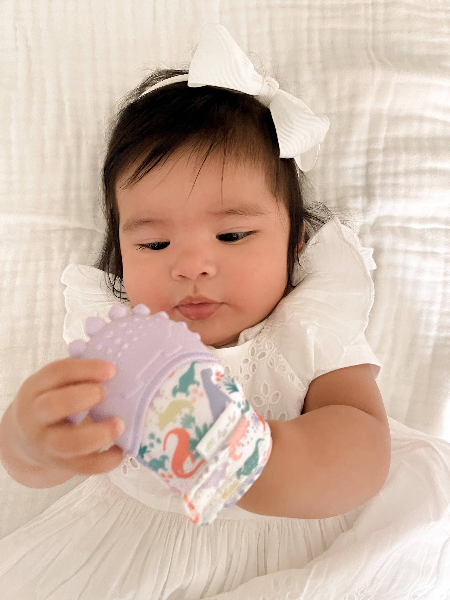 Itzy Mitt™ Silicone Teething Mitts: Lilac Dino